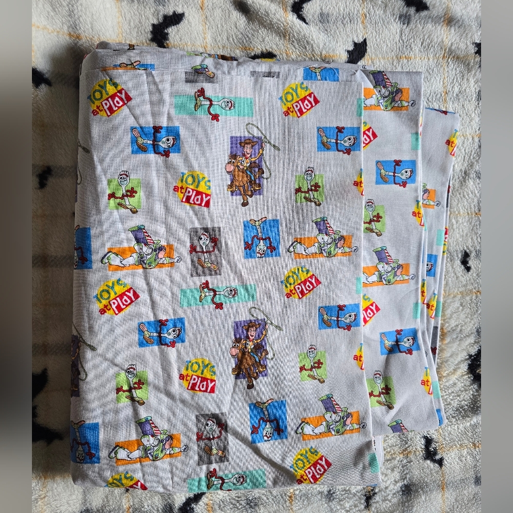 Disney Pixar "Toys at Play" Fabric - Woody, Buzz, Forky - Springs Creative